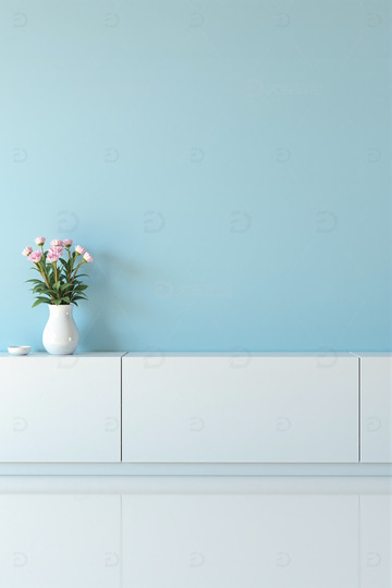 蓝色墙面白色柜子上的花瓶1