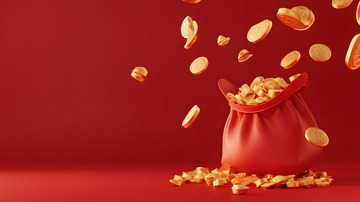 红色财富袋与飞散的金色硬币财富象征