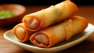 美食春节炸春卷摄影图