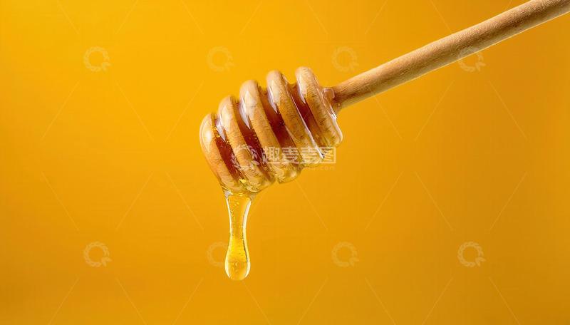 高清大图下载【趣麦麦图】蜂蜜:蜜勺悬垂欲滴的金黄蜂蜜