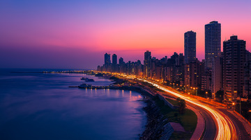 滨海城市日落晚霞风光