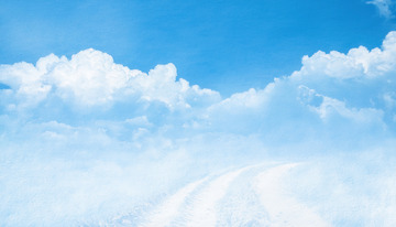 雪路隐于蓝天白云间