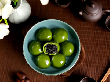 茶席上的青团美味摄影图