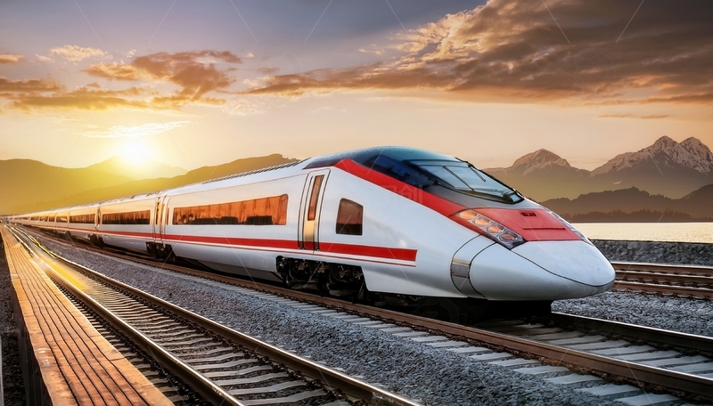 高清大图下载【趣麦麦图】夕阳下高铁疾驰于山间轨道