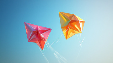 蓝天背景下彩色几何风筝