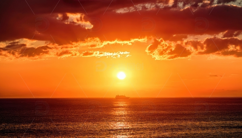 高清大图下载【趣麦麦图】海上孤岛旁的绚烂落日