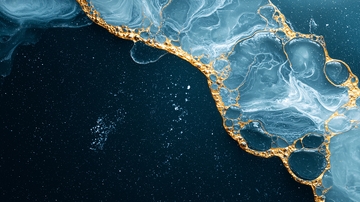 金色液体与蓝色背景的艺术抽象图