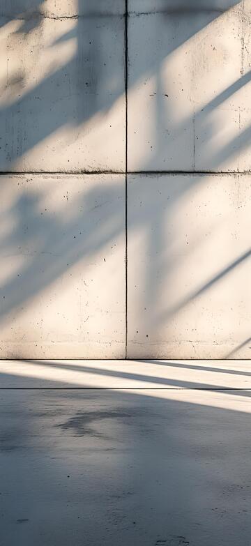 白色混凝土墙上的阴影背景广告图片