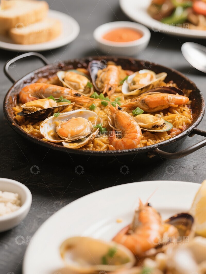 高清大图下载【趣麦麦图】热腾腾的西班牙海鲜饭色彩丰富诱人