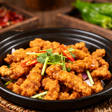 砂锅炸鸡块美食摄影图片