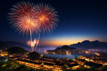 夜景中湖边古建筑旁绽放的烟花