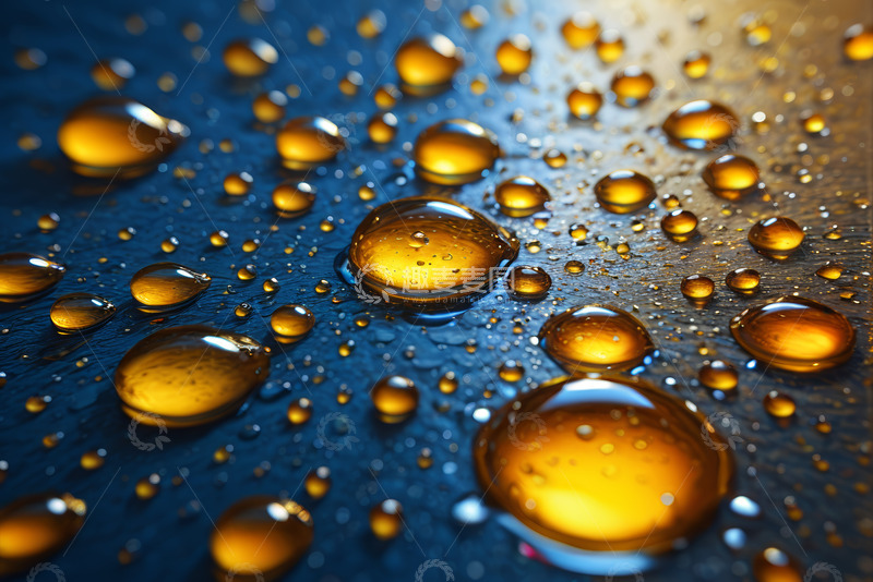 高清大图下载【趣麦麦图】蓝色背景上的金色水滴特写