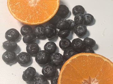 新鲜蓝莓橙子摄影图片