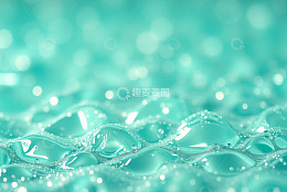 蓝绿色液体表面水滴微距画面