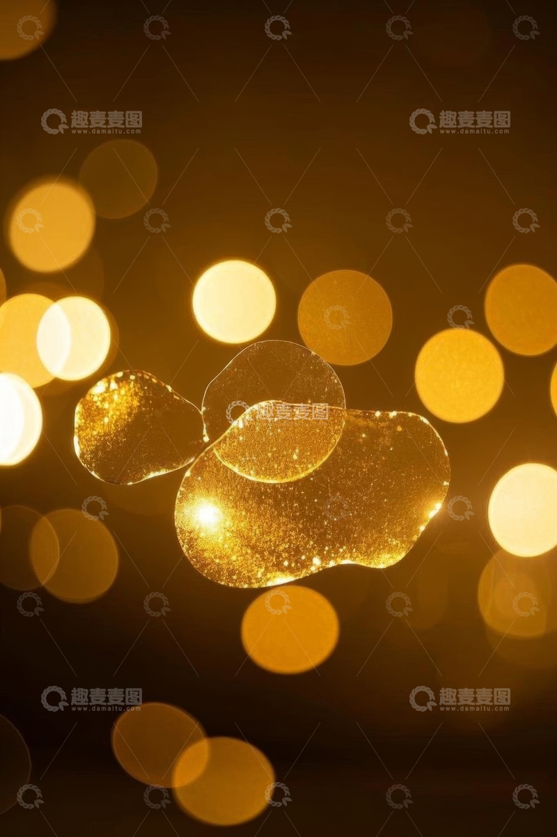 高清大图下载【趣麦麦图】金色光斑背景下的透明物体