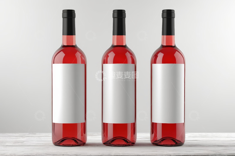 高清大图下载【趣麦麦图】三瓶红葡萄酒摆放在木桌上