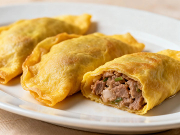 金黄酥脆卷饼美食摄影