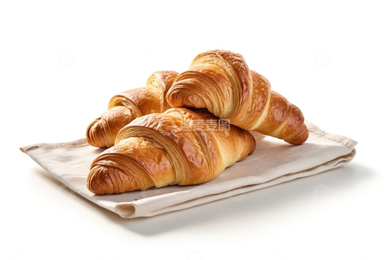 高清大图下载【趣麦麦图】餐巾上摆放的美味牛角面包
