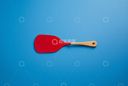 蓝色背景红色硅胶铲