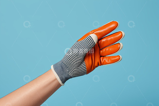 戴橙色防护手套的手部特写