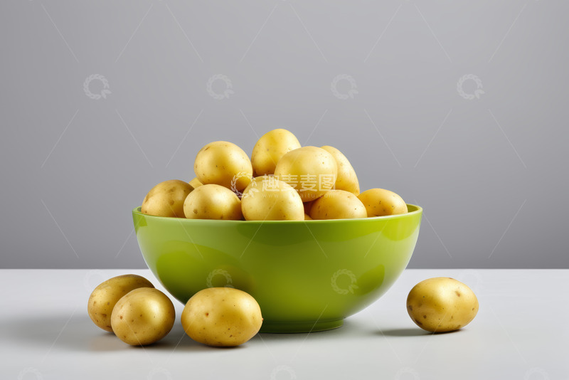 高清大图下载【趣麦麦图】绿碗中堆放的新鲜土豆