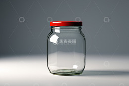 带红色瓶盖的透明玻璃罐