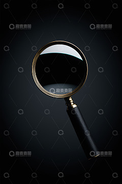 黑色背景下的金属放大镜
