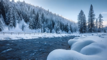 银雪覆松溪谷雾笼林