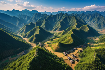 航拍山间村庄与梯田风光