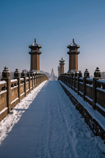 雪后古桥与塔楼景观