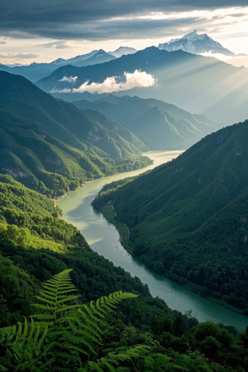 山谷河流与远处雪山景观