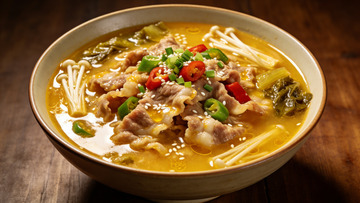 创意美食金汤肥牛摄影图