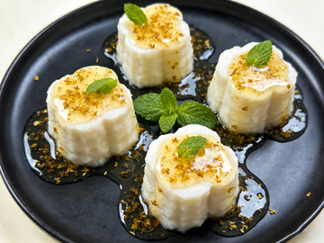 黑盘桂花糕美食摄影