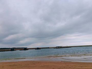 海滩云景风光摄影图片