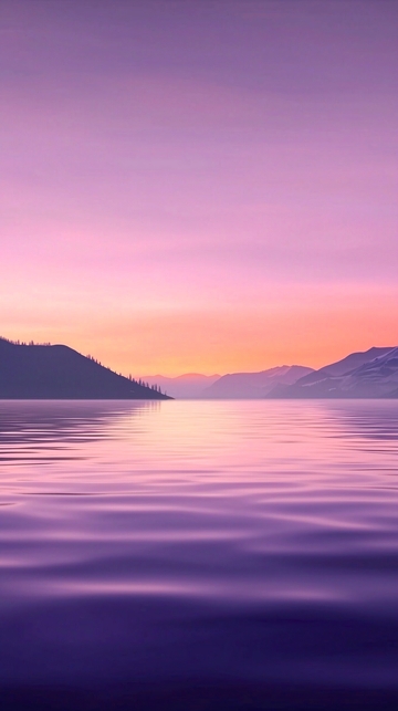 紫色日落湖面山峦