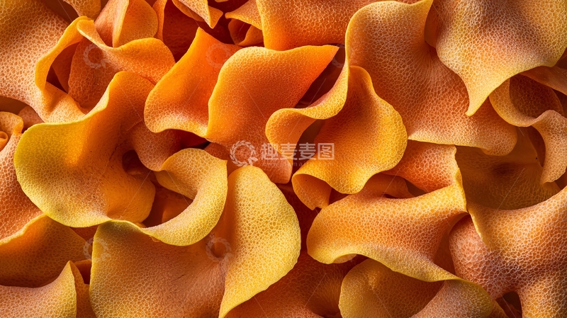 高清大图下载【趣麦麦图】堆叠的橙色波浪形面食