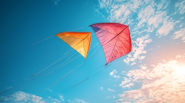 蓝天白云下飞翔的风筝