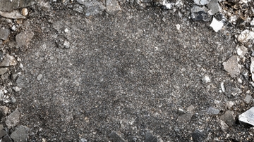 粗糙地面与碎石的特写