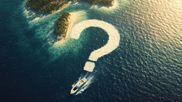 游艇在海面划出问号轨迹