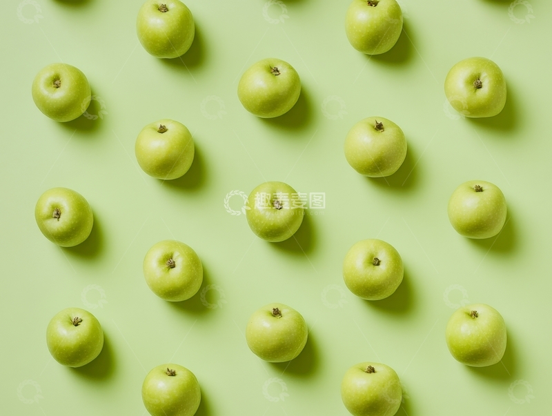 高清大图下载【趣麦麦图】绿色背景上的排列整齐的青苹果