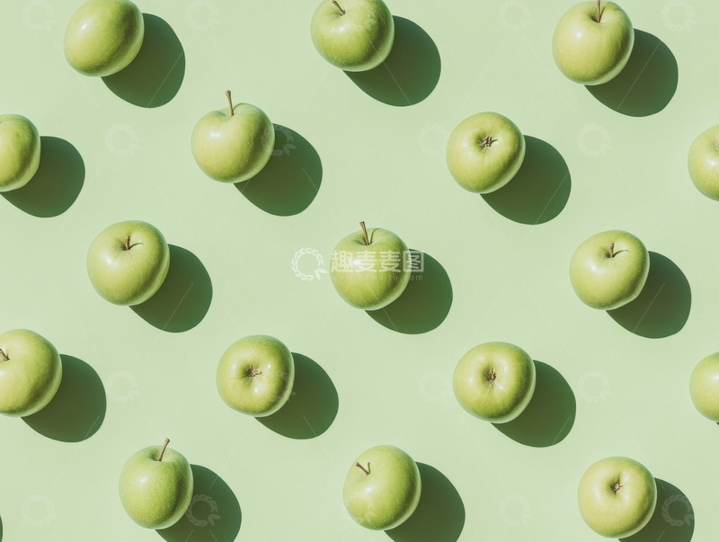 高清大图下载【趣麦麦图】绿色背景上的排列苹果
