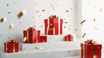 红色礼盒与金色纸屑的节日场景