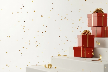 红色礼盒阶梯排列，金色纸屑飘落