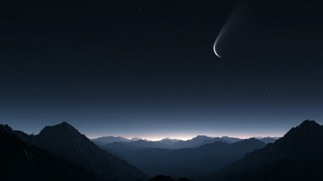 夜空彗星与山脉剪影