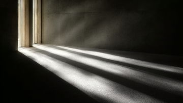 阳光透过窗户投射在地面上的光影