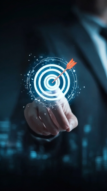 商务人士指尖虚拟靶心箭中目标象征精准决策