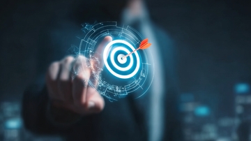 商务人士触碰虚拟目标靶心显示科技数据