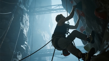 攀岩者在陡峭岩壁上攀登