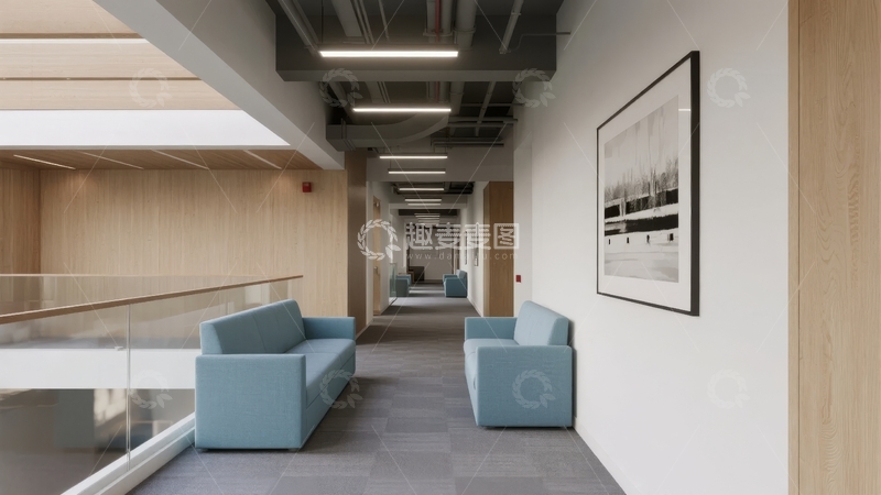 高清大图下载【趣麦麦图】现代办公楼走廊配备蓝色沙发和艺术画作