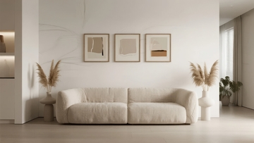 现代简约风格客厅中央摆放着米色沙发